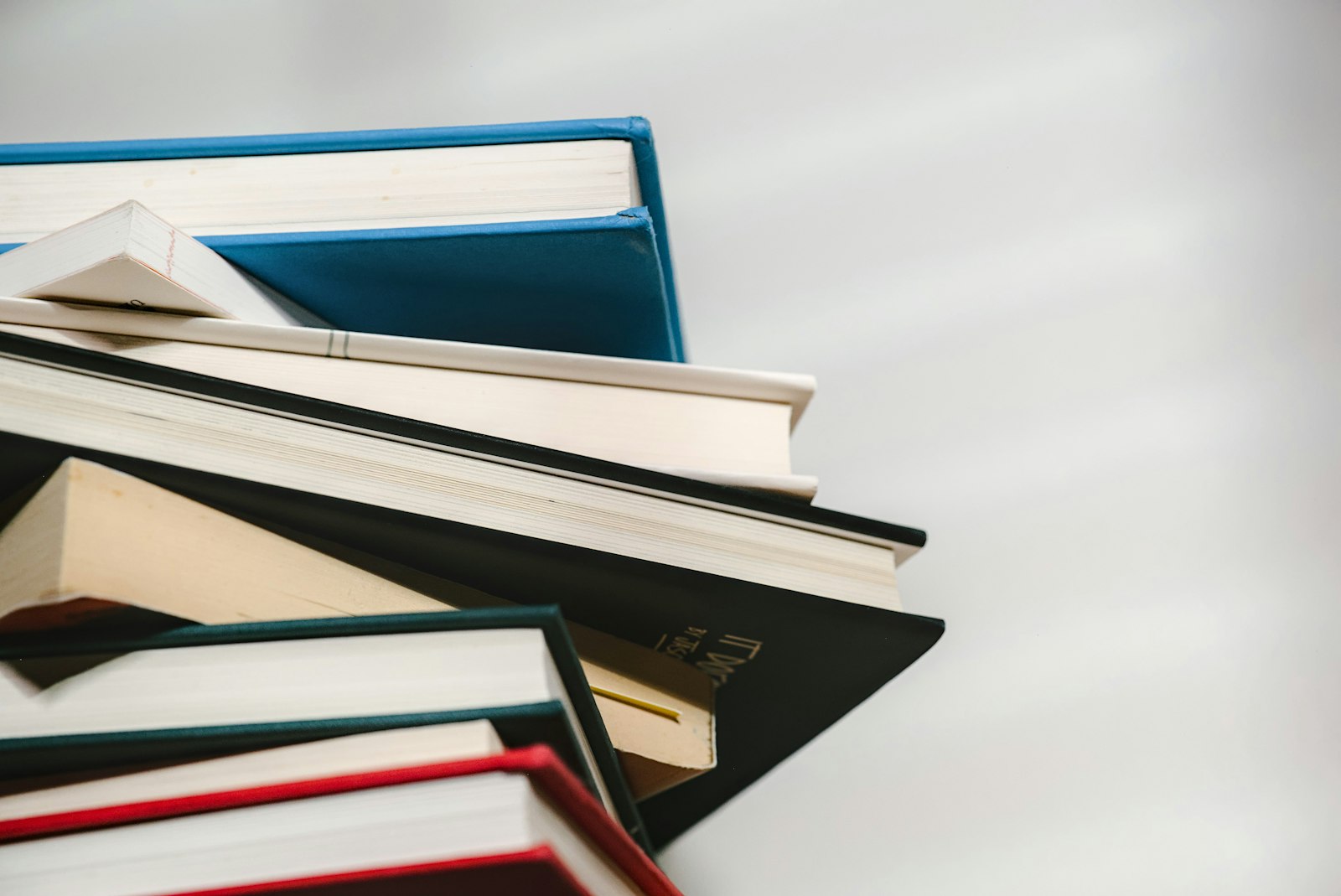 A stack of books piled on top of one another, as in a short print run