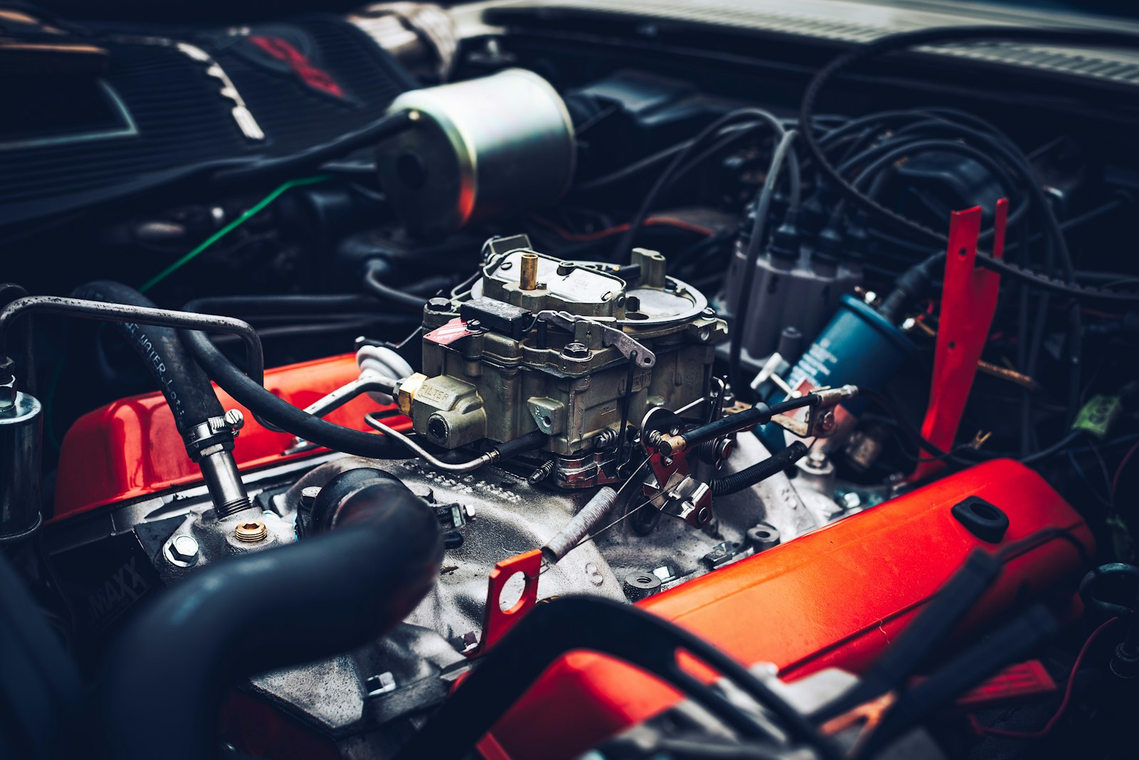 Close-up of a car engine bay showing the components under the bonnet